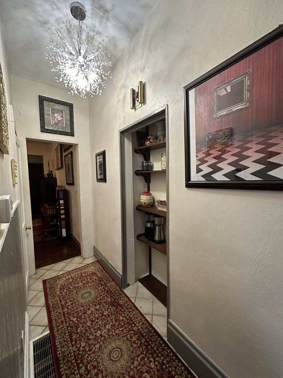 View of the hallway from the kitchen.