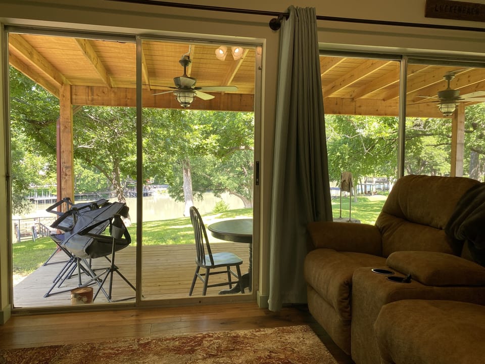 Living room has fantastic view of the water.