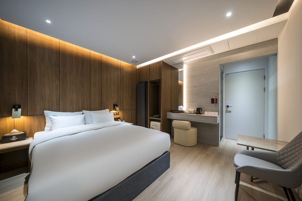 Deluxe Room | Down comforters, memory foam beds, desk, laptop workspace