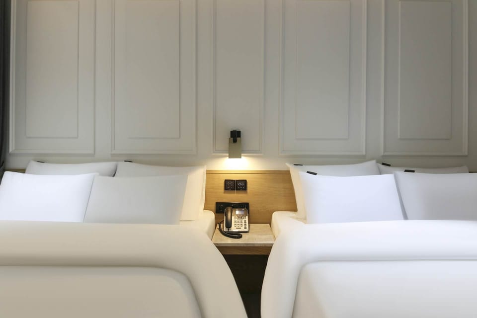 Family Room | Down comforters, memory foam beds, desk, laptop workspace