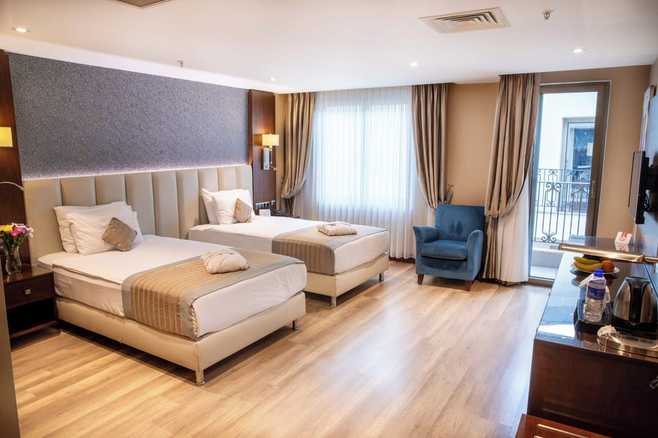 Egyptian cotton sheets, premium bedding, minibar, in-room safe