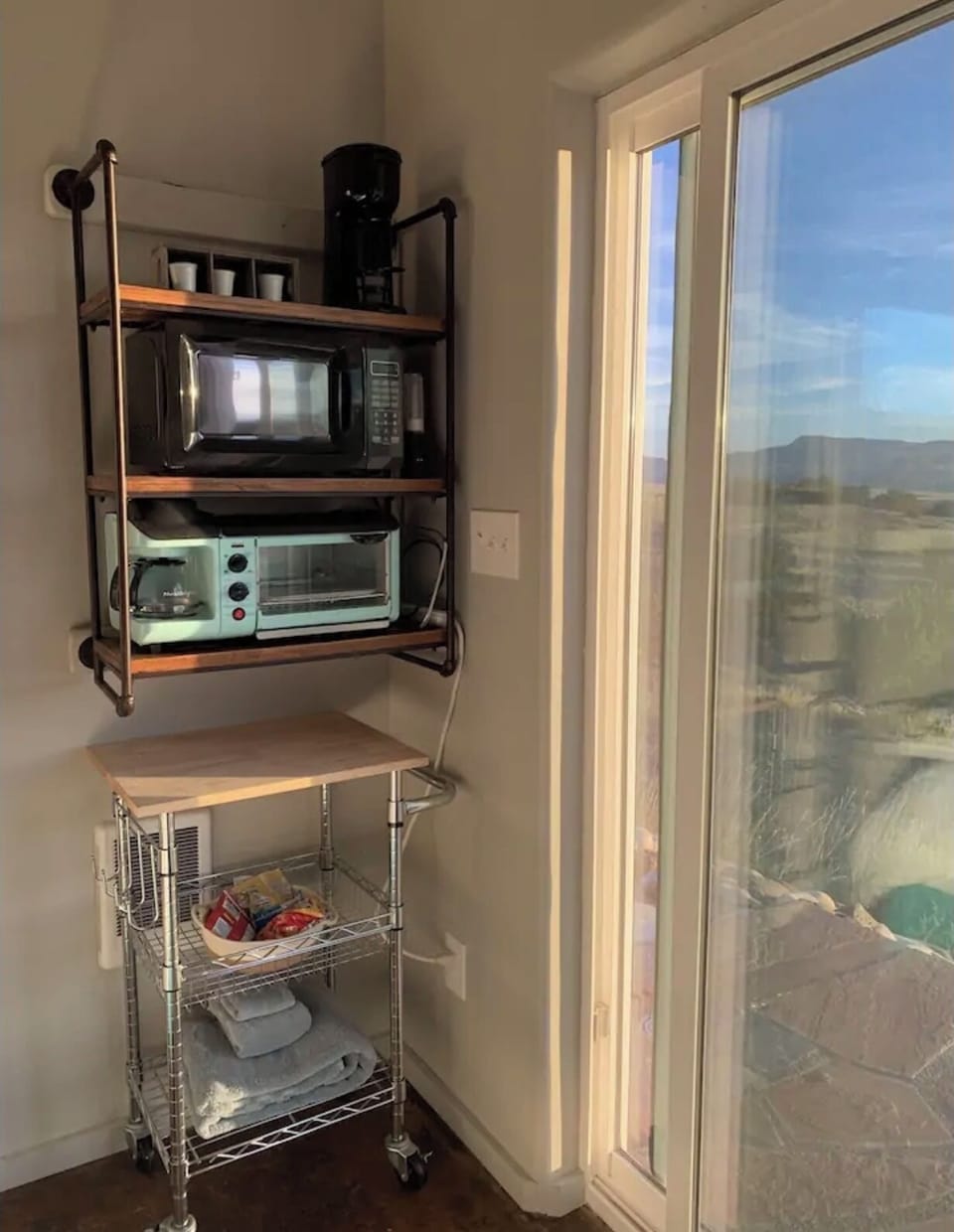 Microwave, toaster oven, and Keurig Coffee Maker.