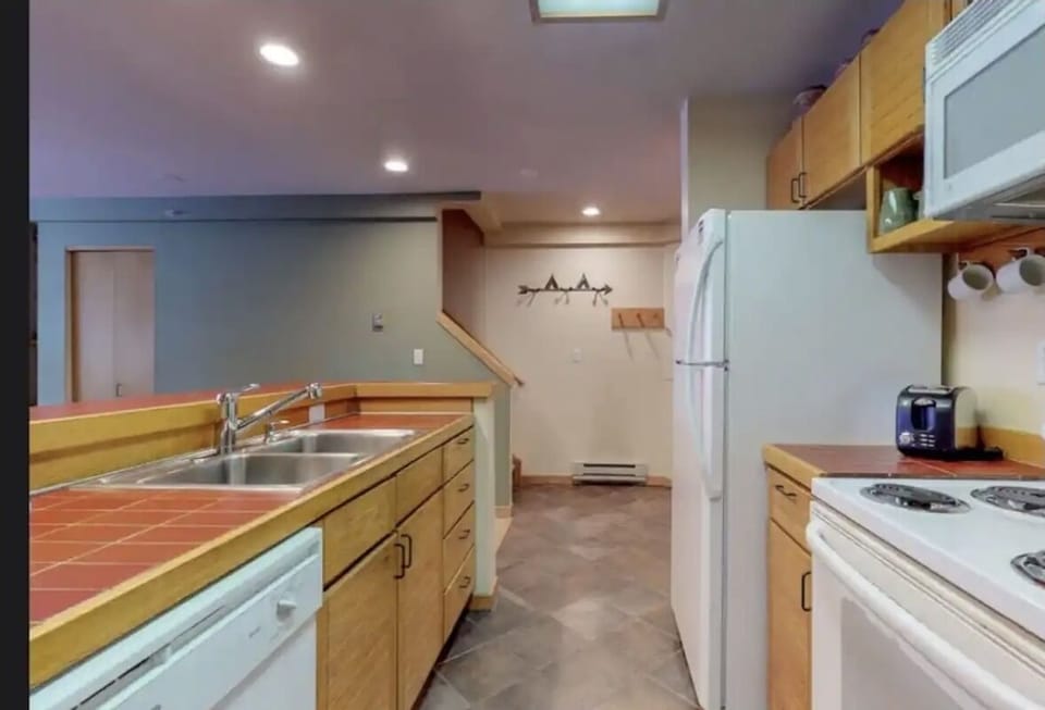 Kitchen area- equipped with UPGRADED stainless steel appliances (not pictured)