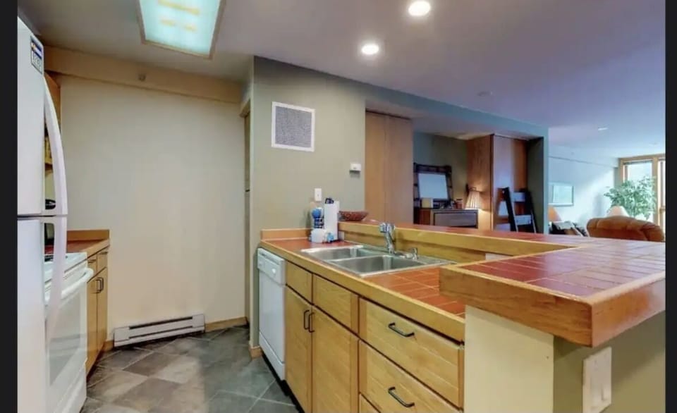 Kitchen area equipped with Keurig and coffee pot for your morning boost!