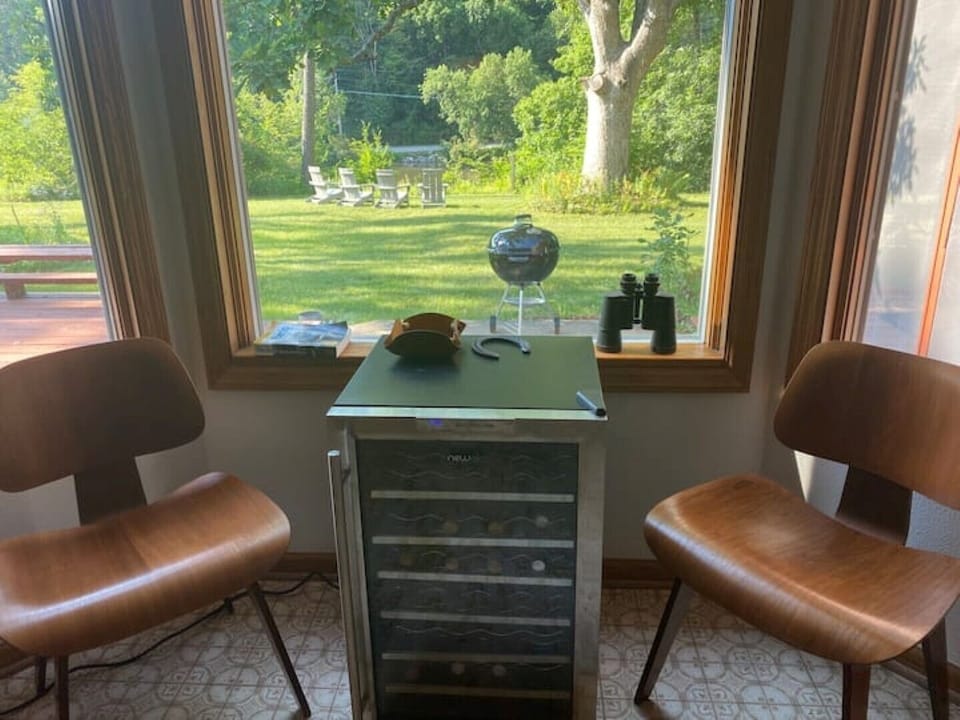 This is a great spot to sight a bald eagle.  Handy binoculars and wine fridge.
