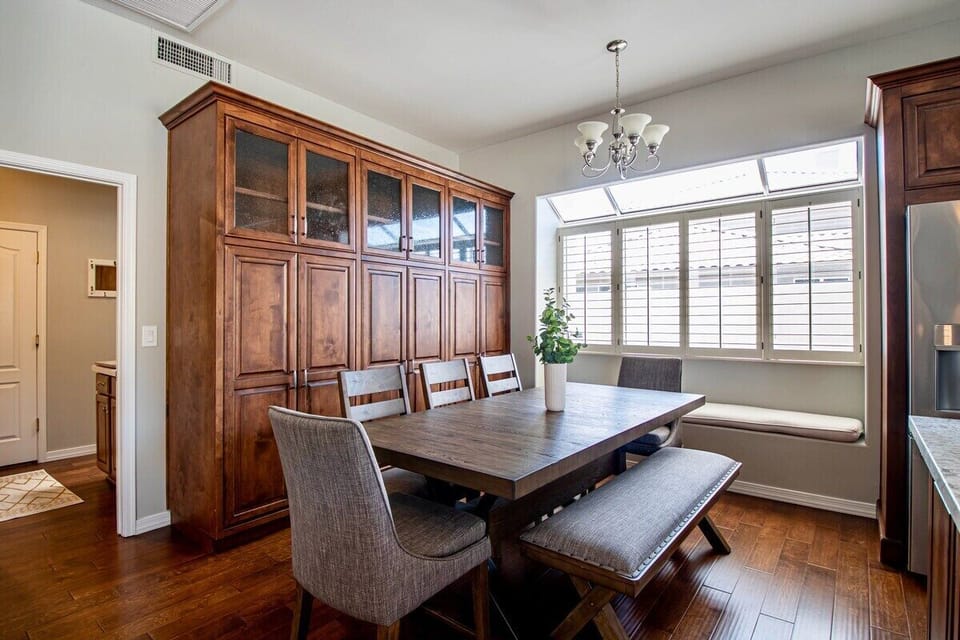 Enjoy meals with family and friends.  Dining table with seating for 8.  Additional leaf to extend for more seating.