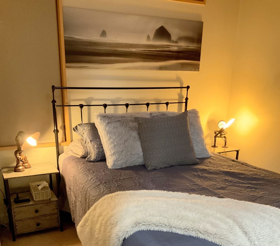 Our extra comfy queen-sized bed lulls you to sleep!