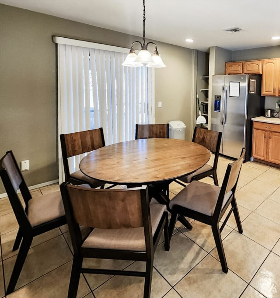 Spacious kitchen with all major appliances and updated dining table that comfortably seats six
