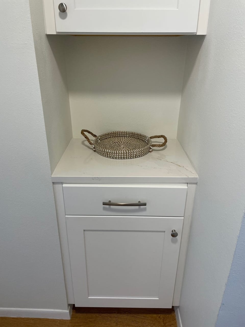 Foyer with upper and lower 
cabinets for storage