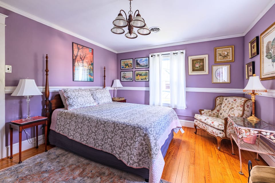 This bedroom has a new queen sized mattress, a dresser and a closet,