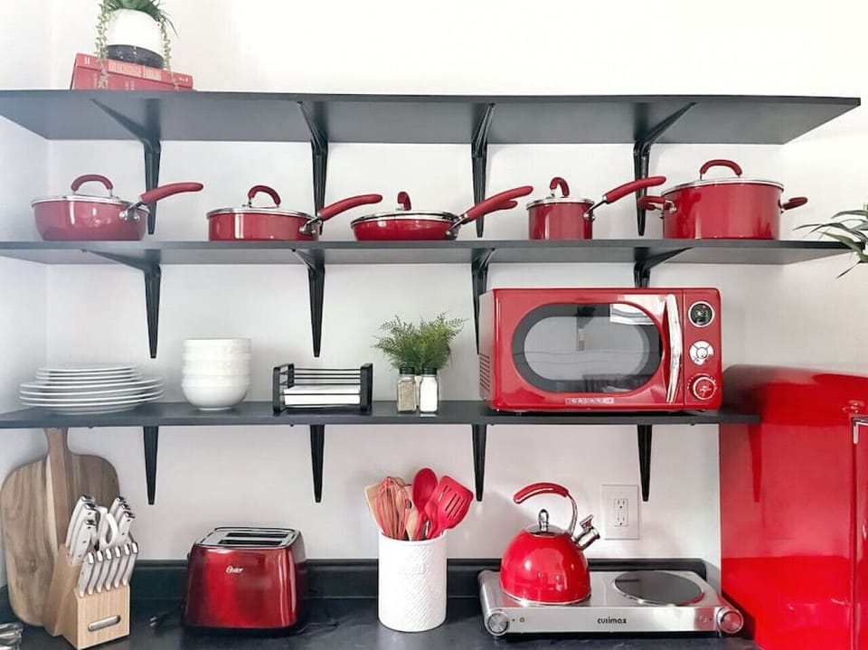 Organized kitchen storage for appliances, pots, and utensils 🍴🧹