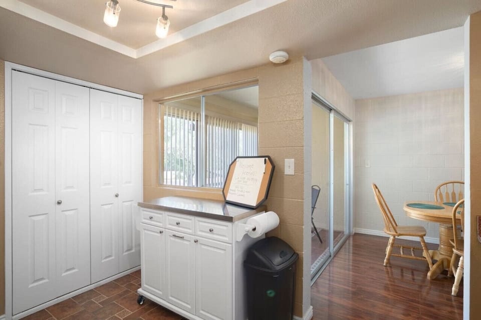 Enjoy the patio view & serve easily through the kitchen’s sliding window.