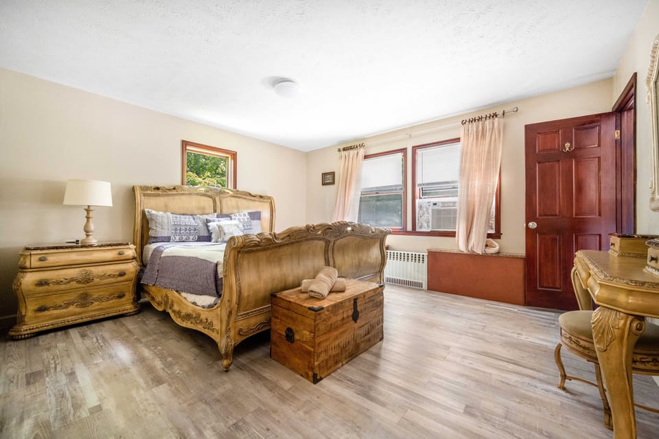 Stylish bedroom with modern touches and plush bedding for restful nights.