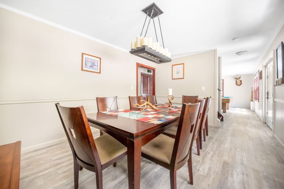 Fully equipped kitchen and cozy dining area for easy meals and gatherings."