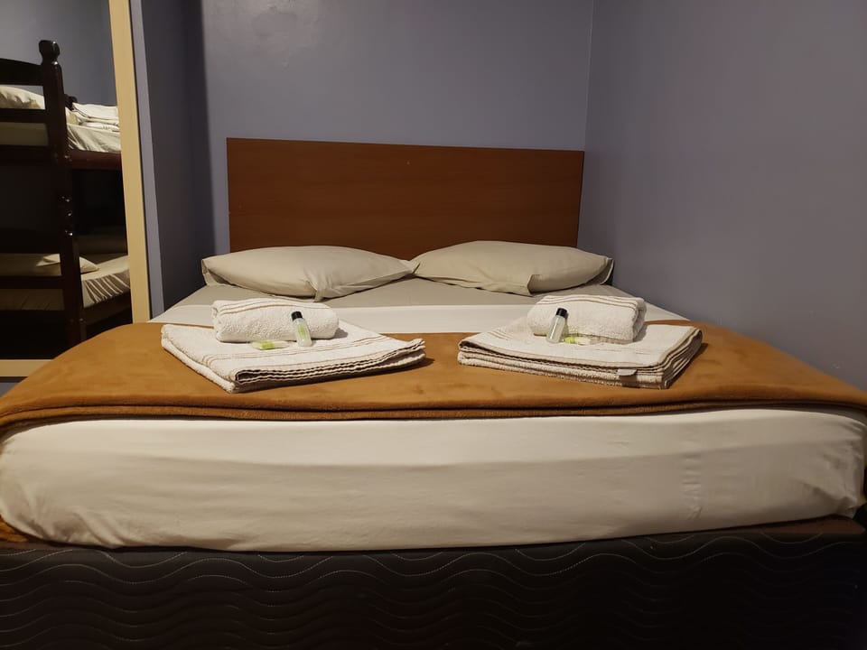 Family Room | Minibar, WiFi (free), bed sheets