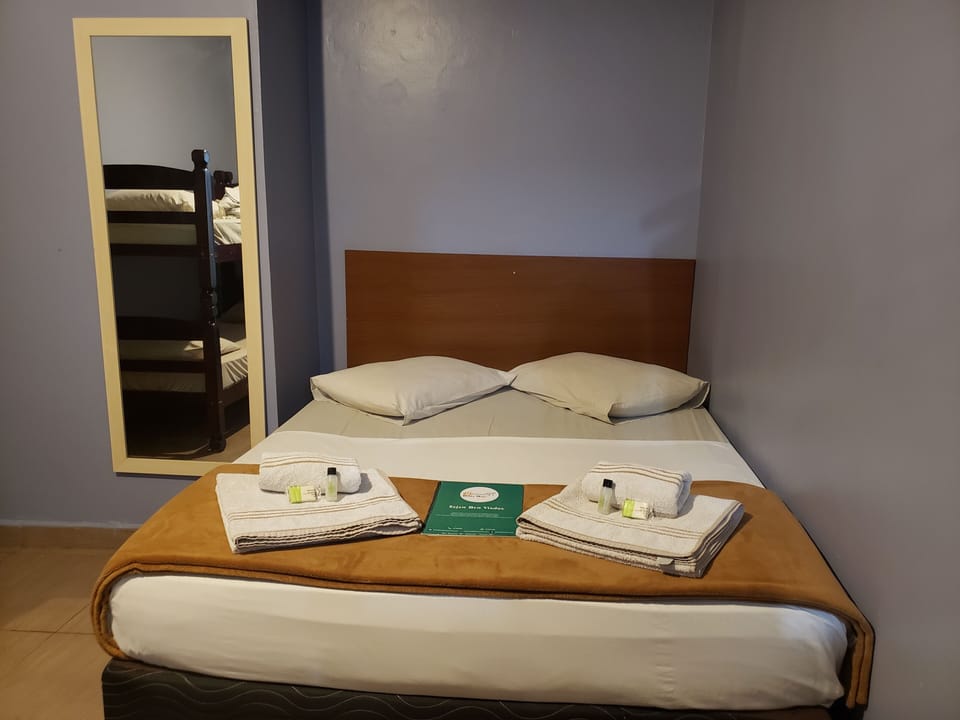 Family Room | Minibar, WiFi (free), bed sheets