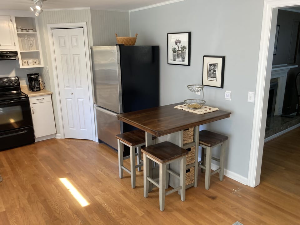 Breakfast table. Pantry door in corner.