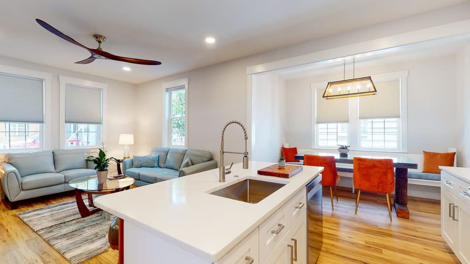Island countertop with sink and dishwasher