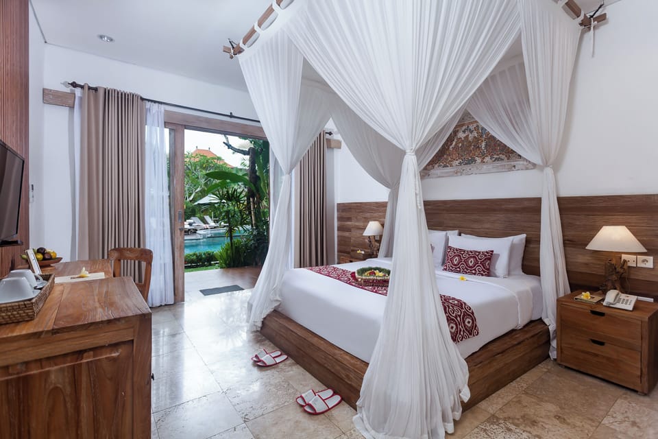 Suite with Pool Access | Minibar, in-room safe, iron/ironing board, free WiFi