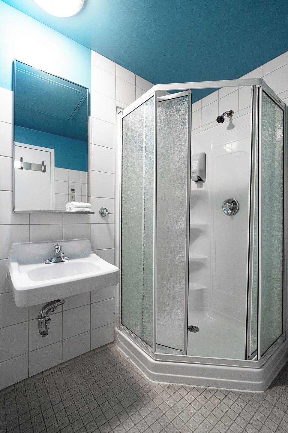 Family room with private bathroom | Bathroom | Shower, hair dryer, towels