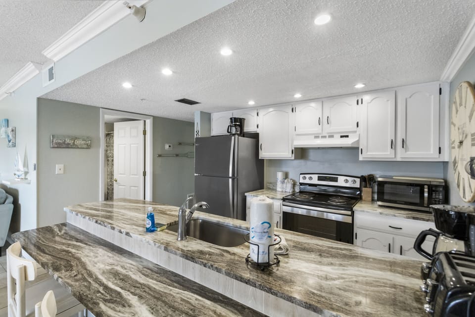 Spacious kitchen with granite counters