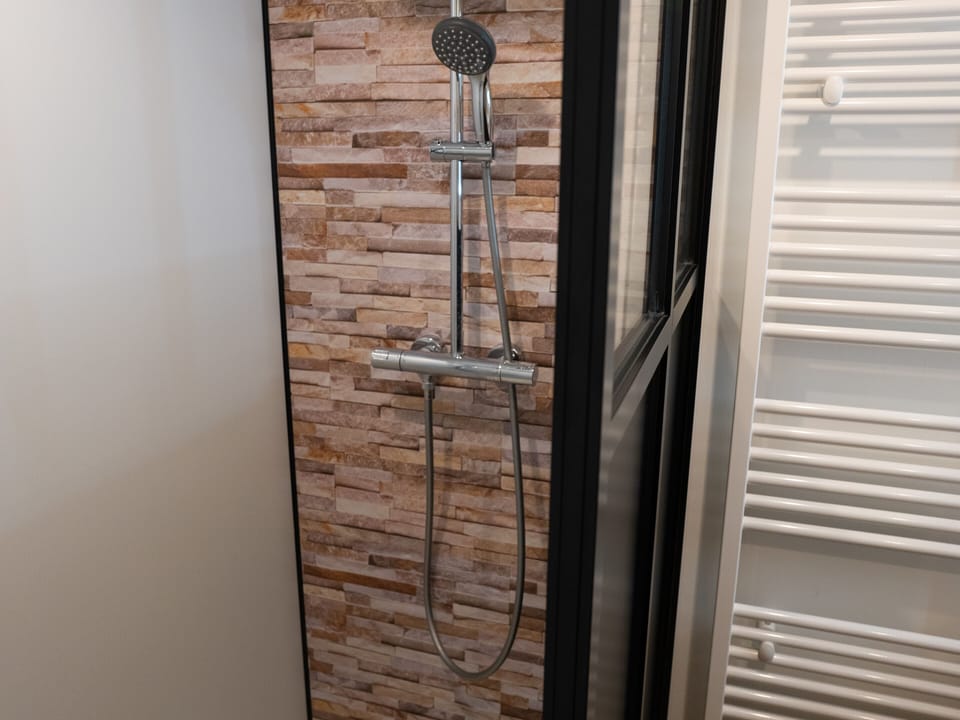Ground floor shower room with shower, WC and washing machine