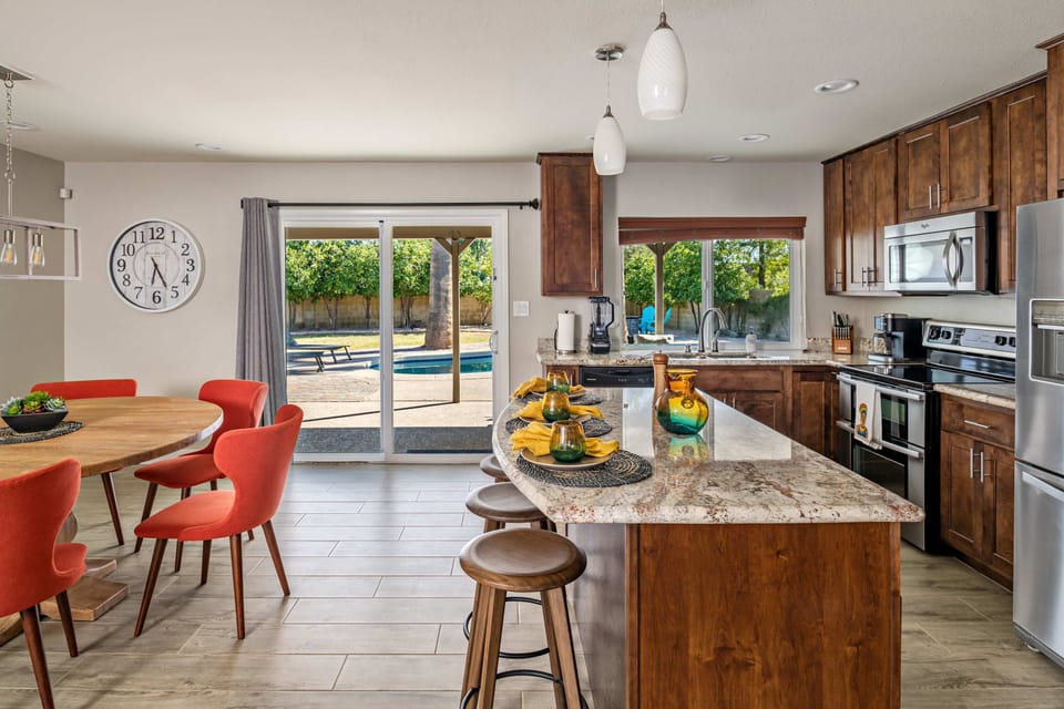 Open air dining and kitchen area with a sit up bar!
