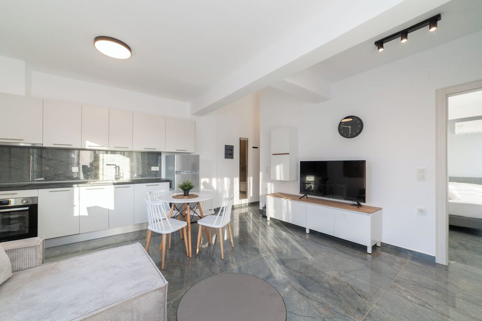Deluxe Duplex, 2 Bedrooms, Garden View | Private kitchen | Full-size fridge, oven, stovetop, coffee/tea maker