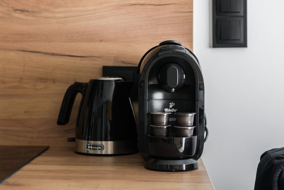 The fully equipped kitchenette includes everything you need for a home-cooked meal.