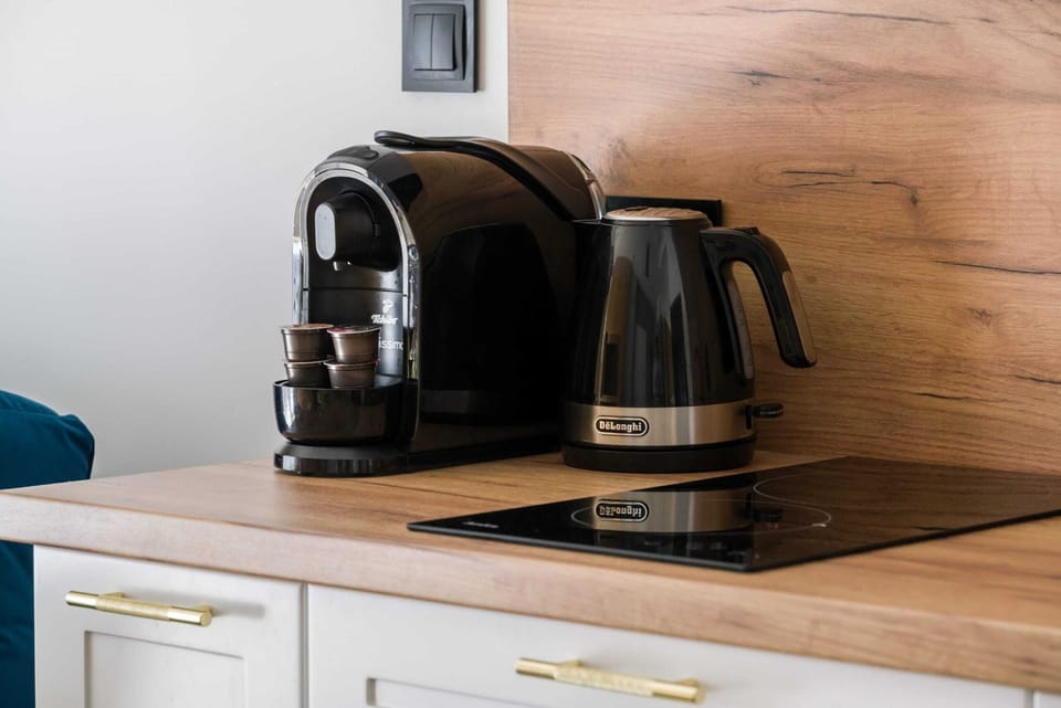 The fully equipped kitchenette includes everything you need for a home-cooked meal.