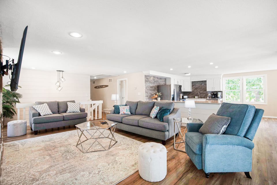 Open to kitchen, dining & living spaces to connect