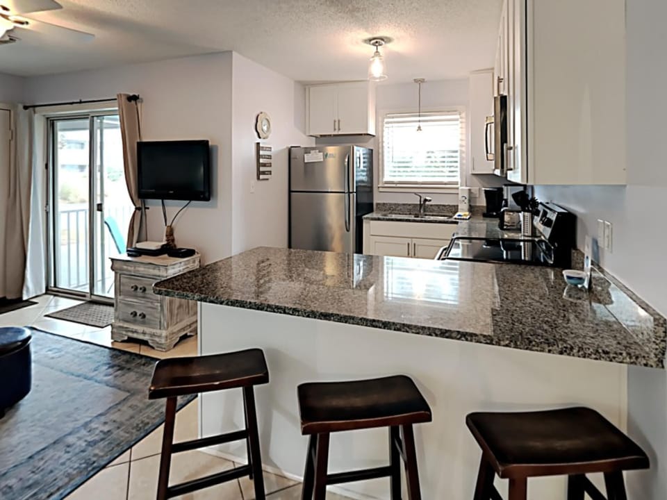 Bar Seating and Kitchen