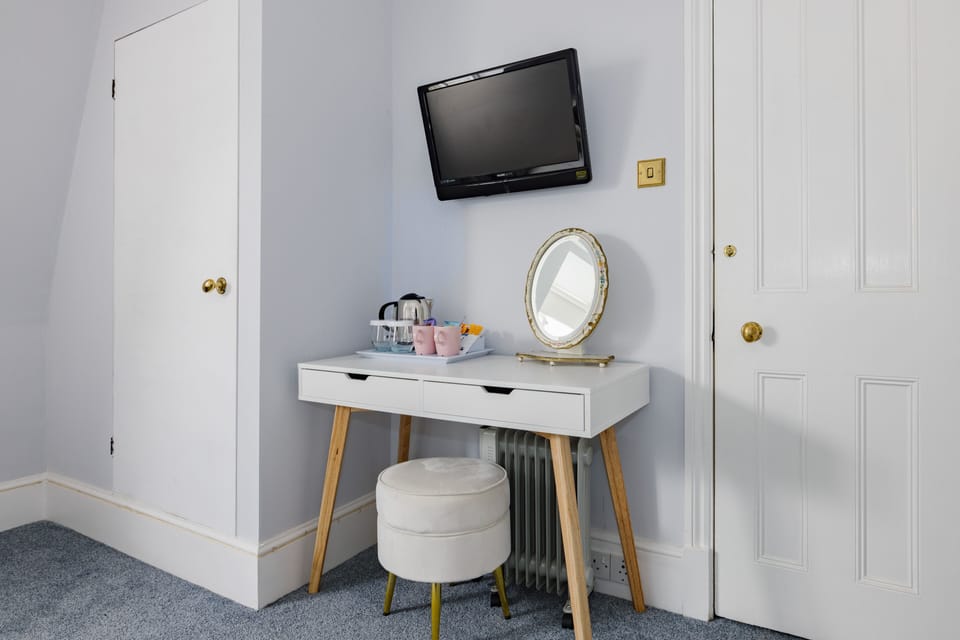 Hypo-allergenic bedding, desk, laptop workspace, iron/ironing board
