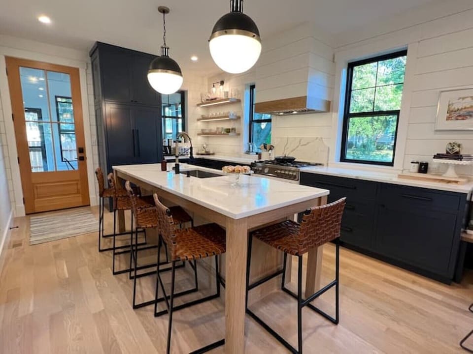 Kitchen with custom cabinets and hidden appliances