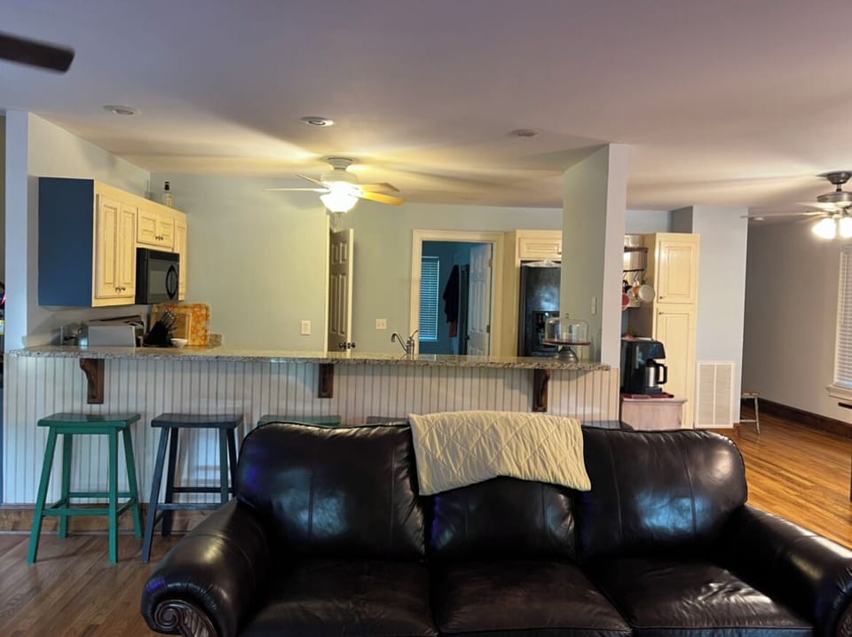 Main level open concept living area.  Kitchen bar can accomodate 6 guests.