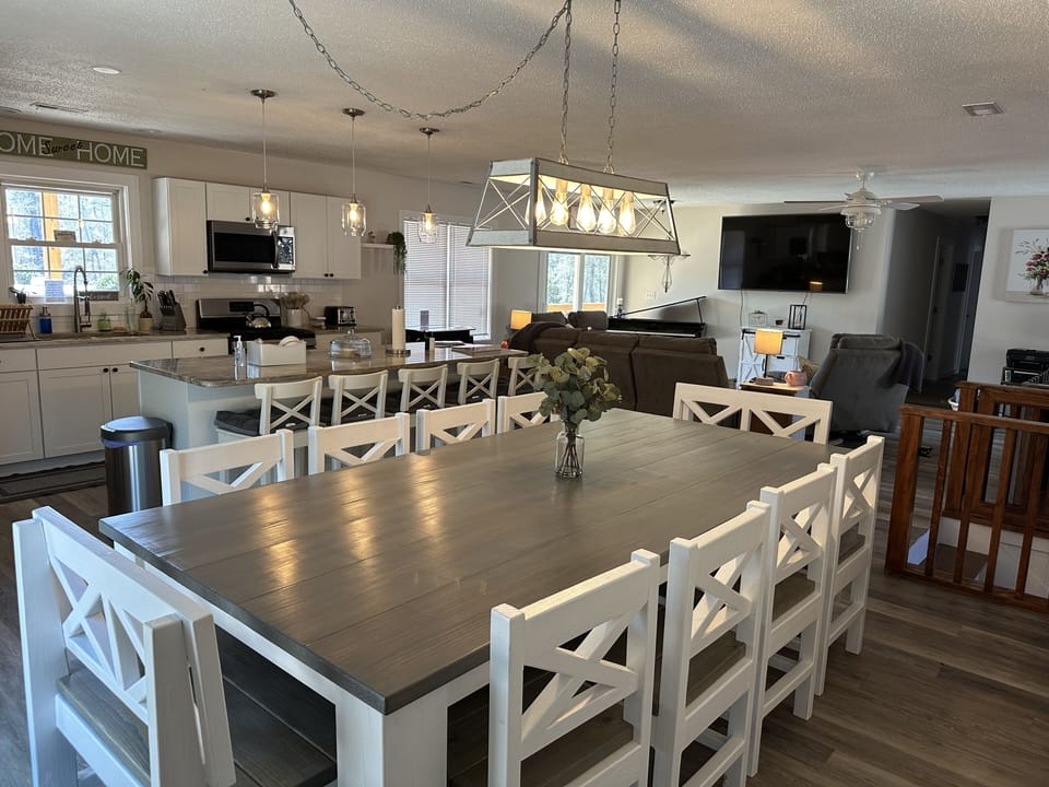 Kitchen table for 12 
and Island with stools that seat 5