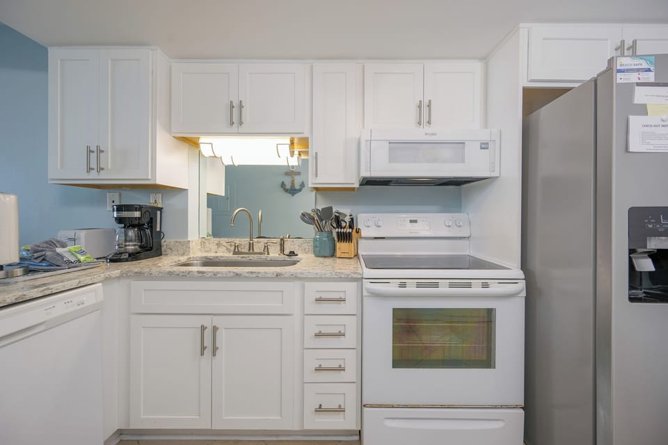 Prepare your favorite snacks and drinks easily in this bright kitchen, perfect for creating lasting vacation memories