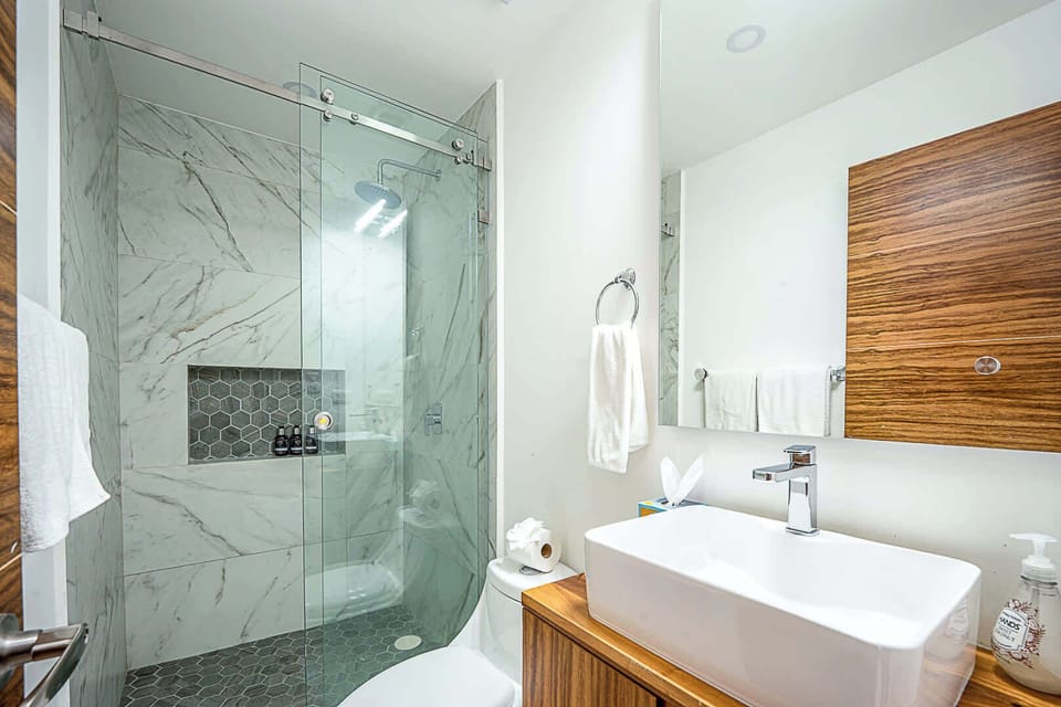 A stylish bathroom with all the essentials for a comfortable stay.