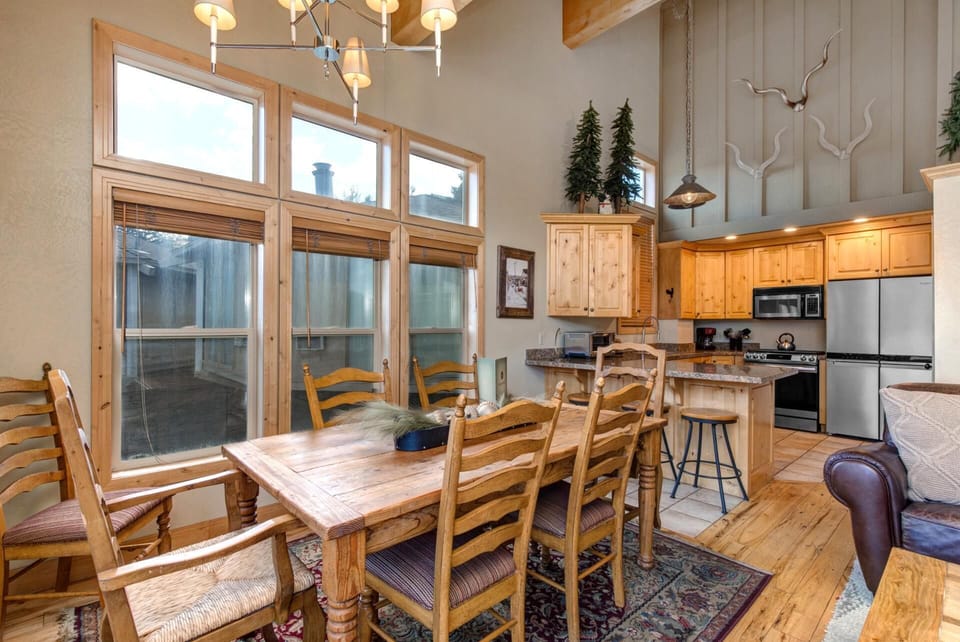 Share meals and stories at your dining table for six, with views and natural light streaming through the windows.