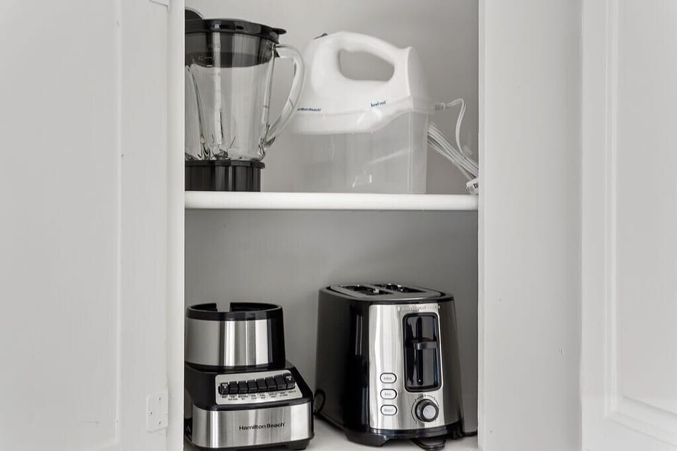 The small appliances are tucked away for when you need them.