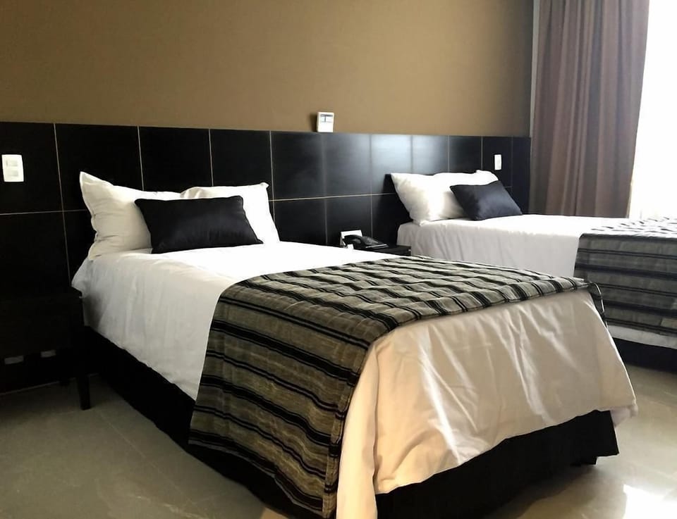 Minibar, desk, soundproofing, bed sheets