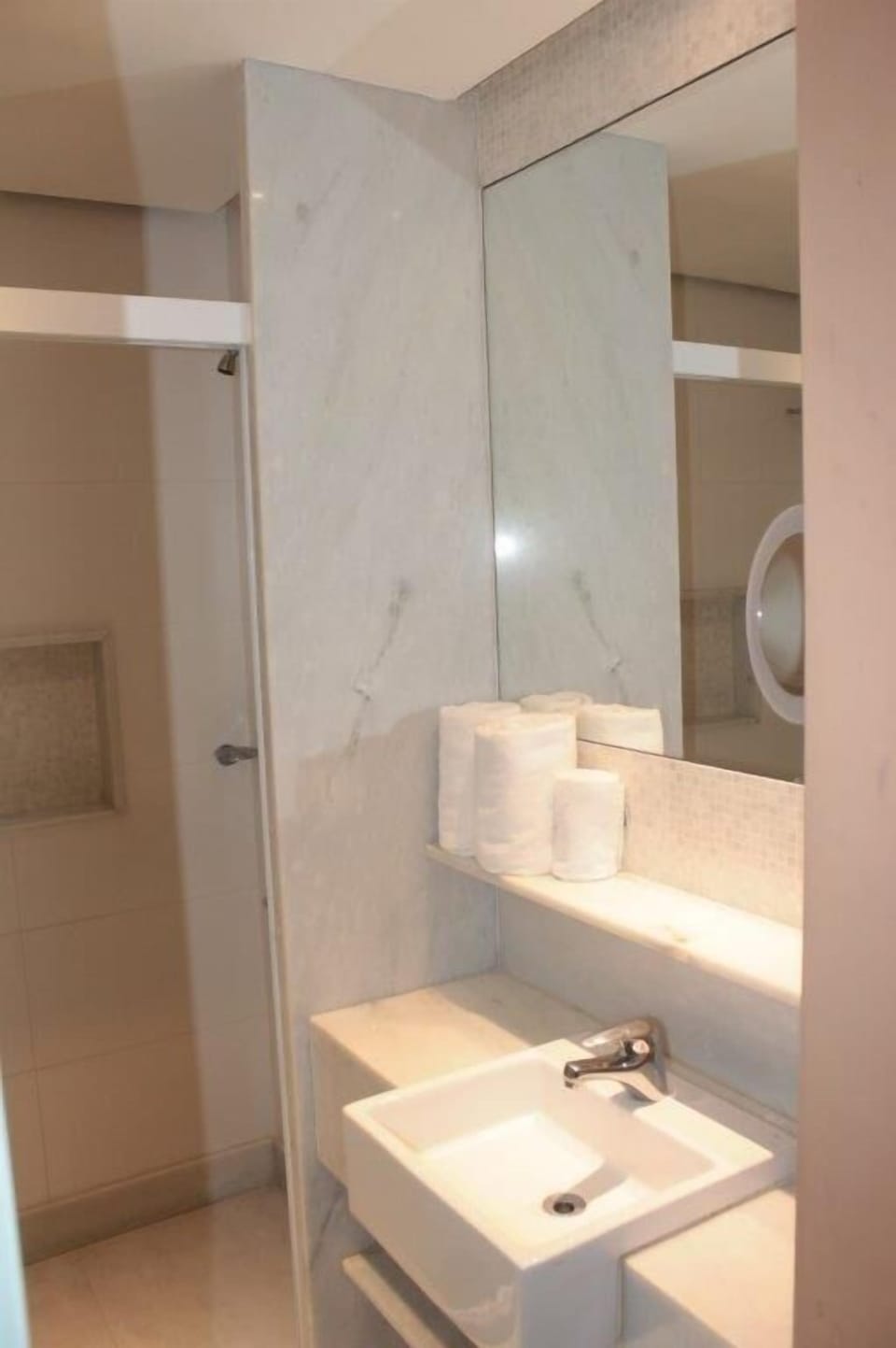Shower, rainfall showerhead, towels, soap