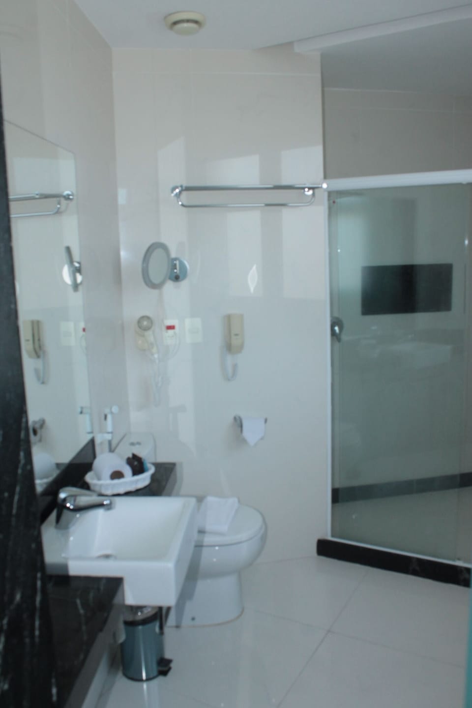 Shower, rainfall showerhead, towels, soap