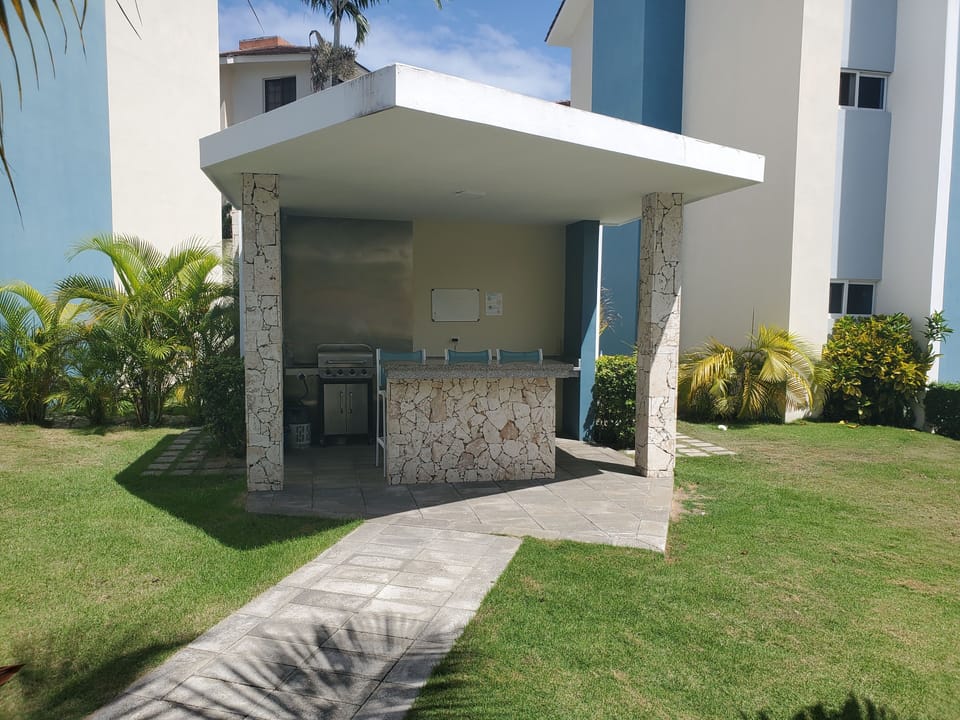 Outdoor seating and
 grill area with 2 bathrooms