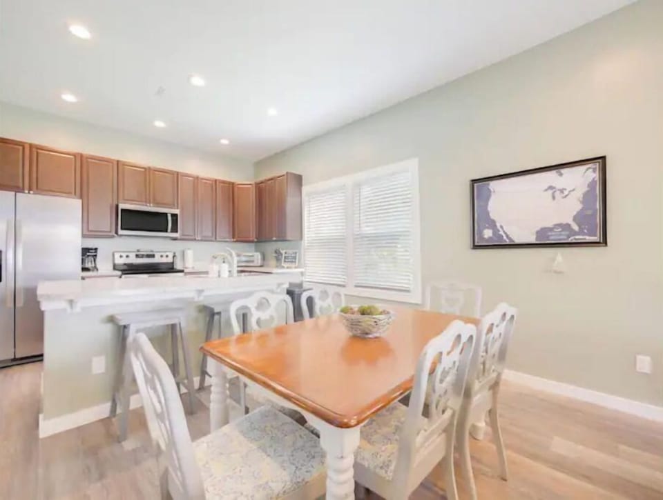 Eat at the dining table or at the kitchen island.