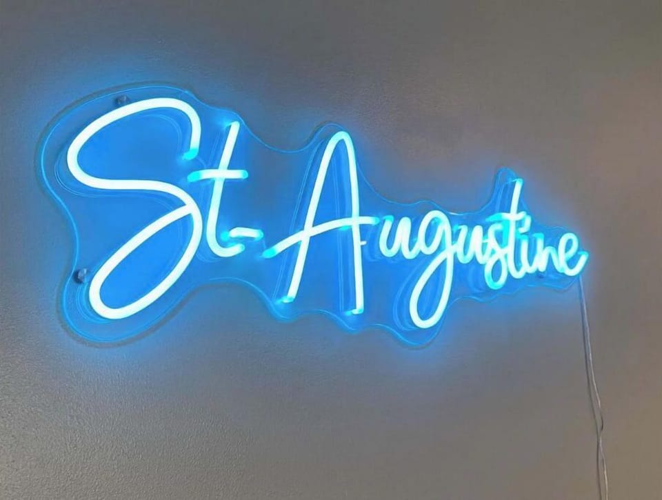 Take a picture under our neon sign and tag our Instagram: @neros_nest