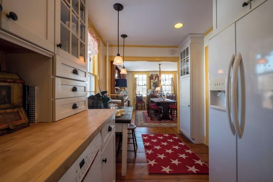 This picture really shows how the galley kitchen opens into the dining room. I love how the sun light fills the room in the morning!