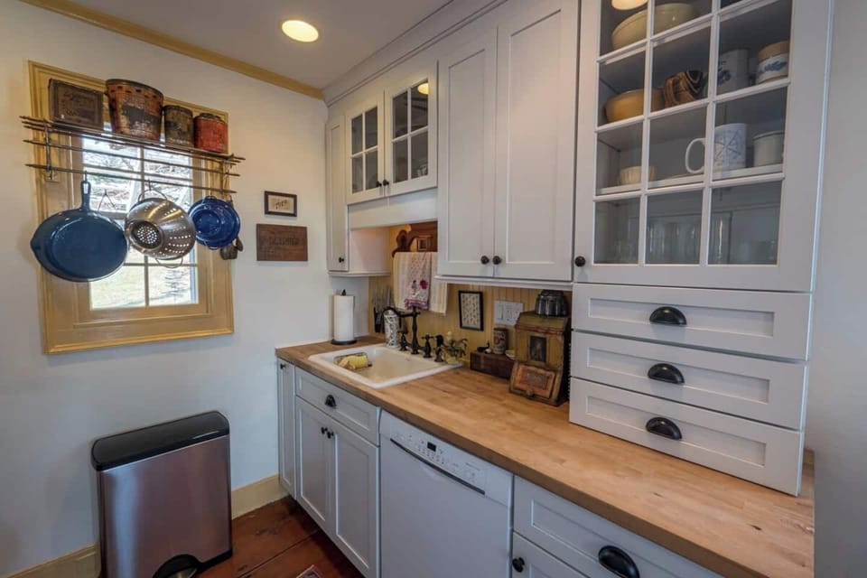 Everything you need in the sweet galley kitchen. Yes, there's coffee, sugar, and real cream waiting in the fridge for you, too!
