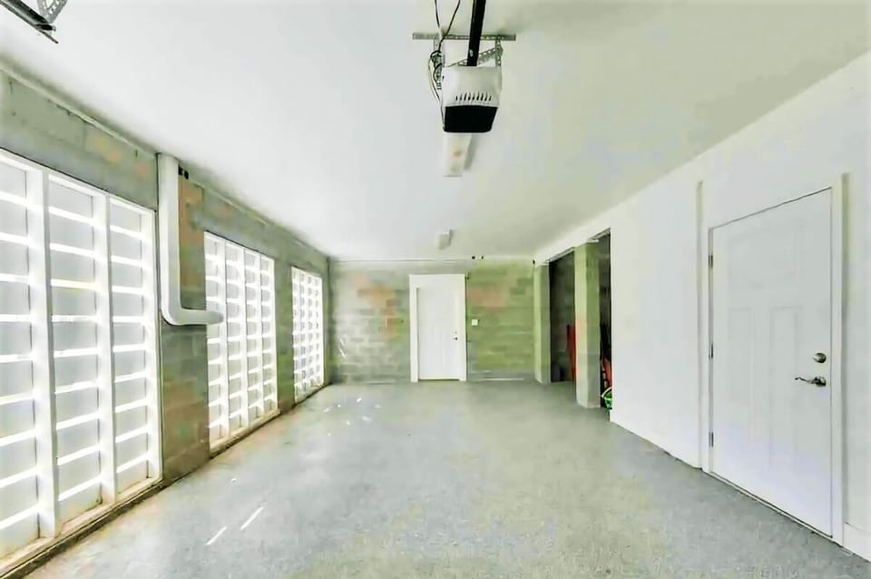 Secure parking and extra storage space available in the garage.