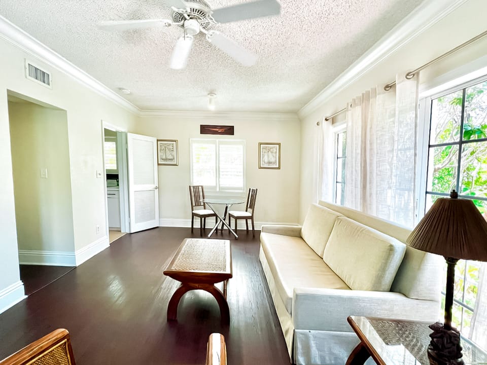 Suite, 1 Bedroom | Living area | 1-inch flat-screen TV with cable channels, TV, streaming services